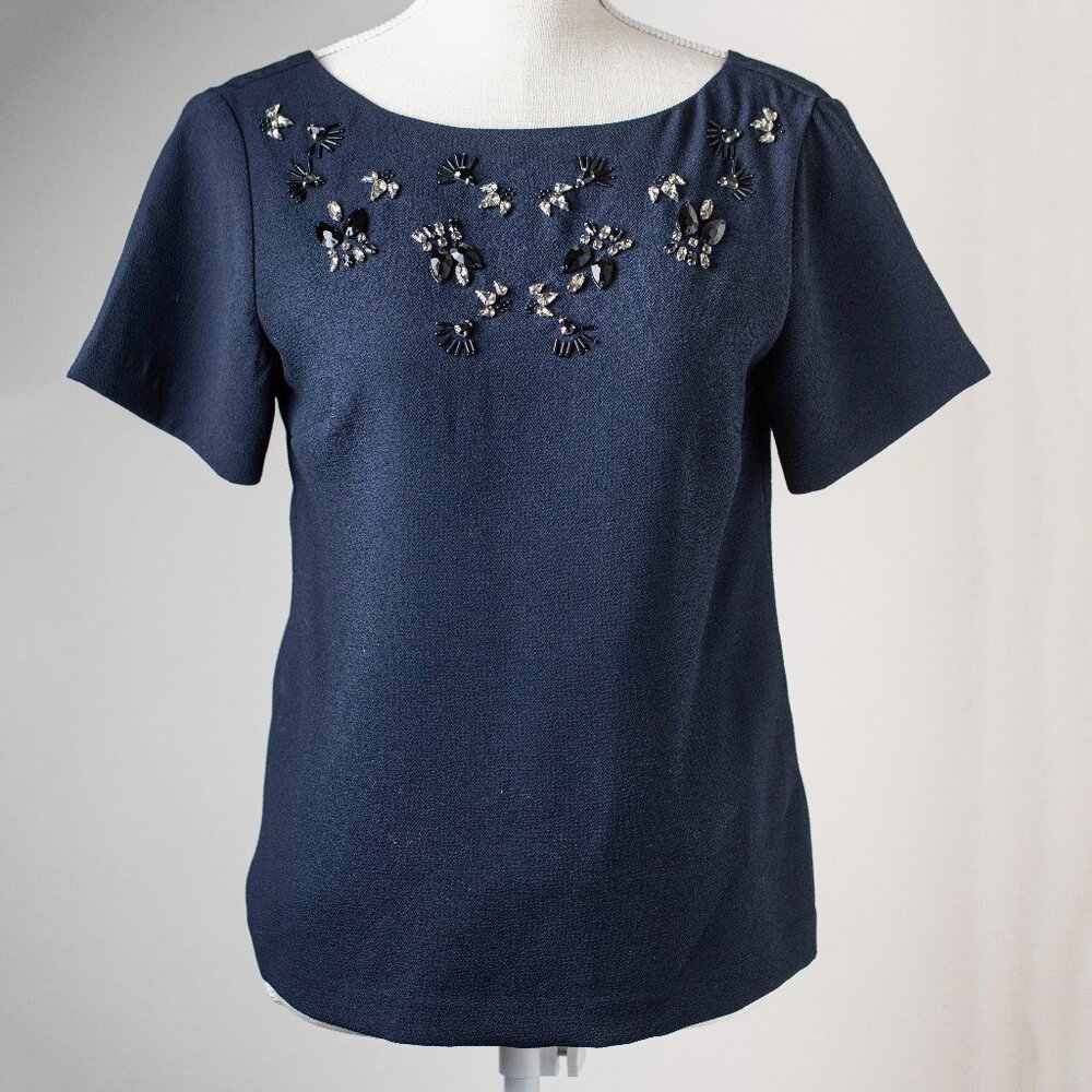 Navy blue top with jewel accents